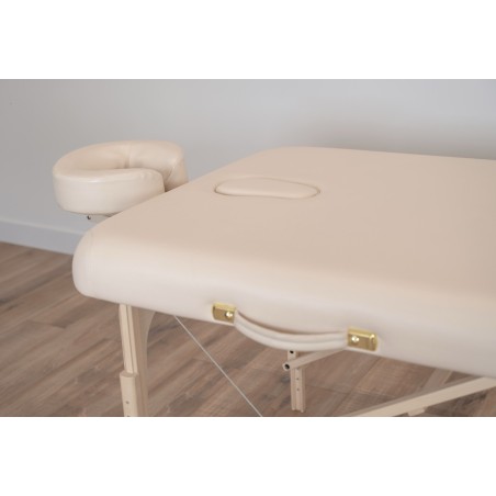 Table de massage Lunian 80 avec appui-tête réglable, offrant un confort ergonomique pour les soins.