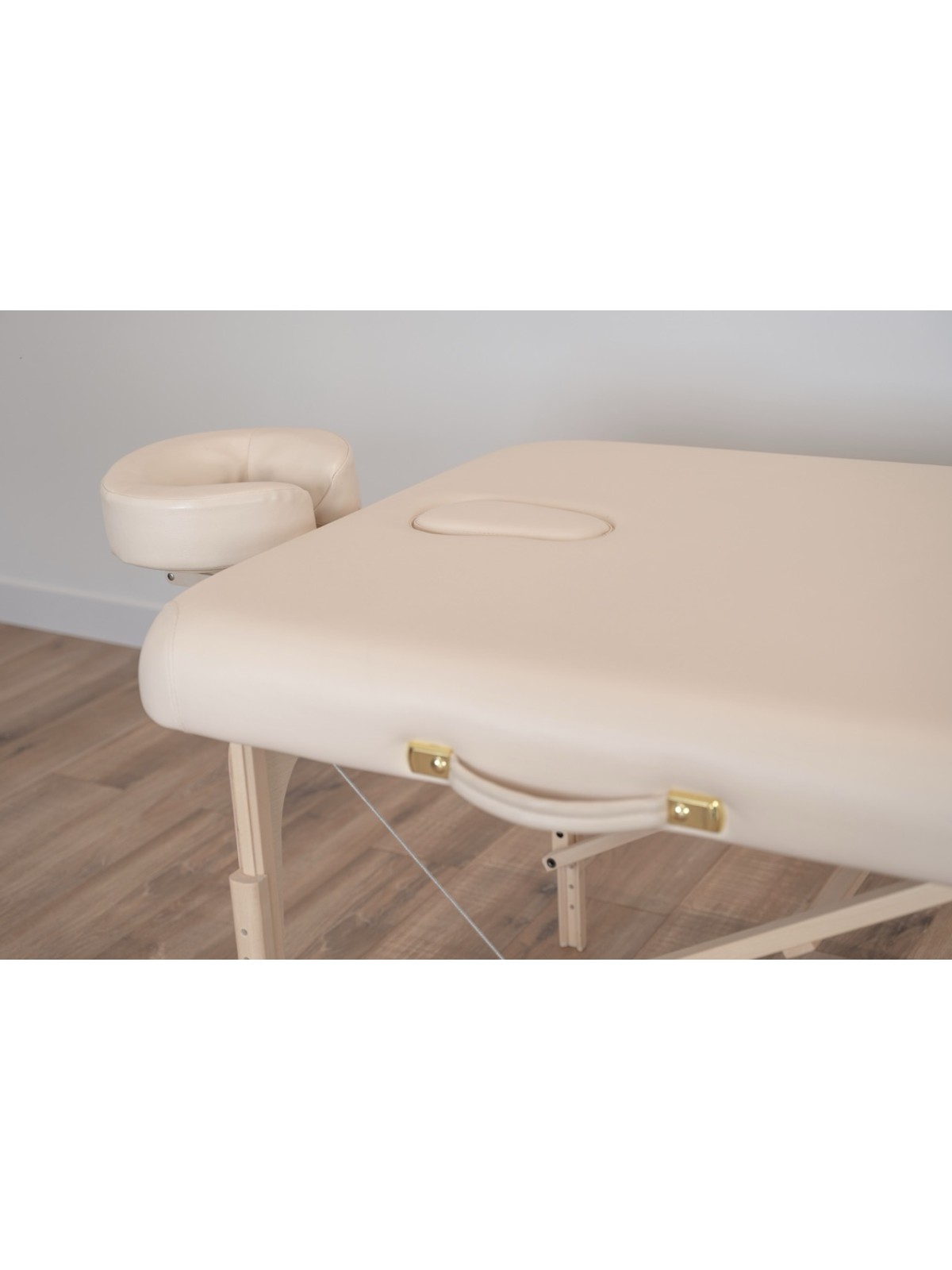 Table de massage Lunian 80 avec appui-tête réglable, offrant un confort ergonomique pour les soins.