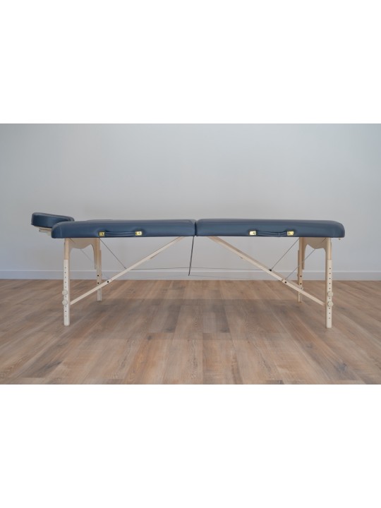 Table de massage Lunian 80 avec rembourrage bleu, offrant un soutien supérieur et un design élégant. Table de massage Lunian 80 avec rembourrage bleu, offrant un soutien supérieur et un design élégant.