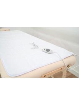 Matelas chauffant pour table de massage, offrant une chaleur apaisante et uniforme pour les soins thérapeutiques.