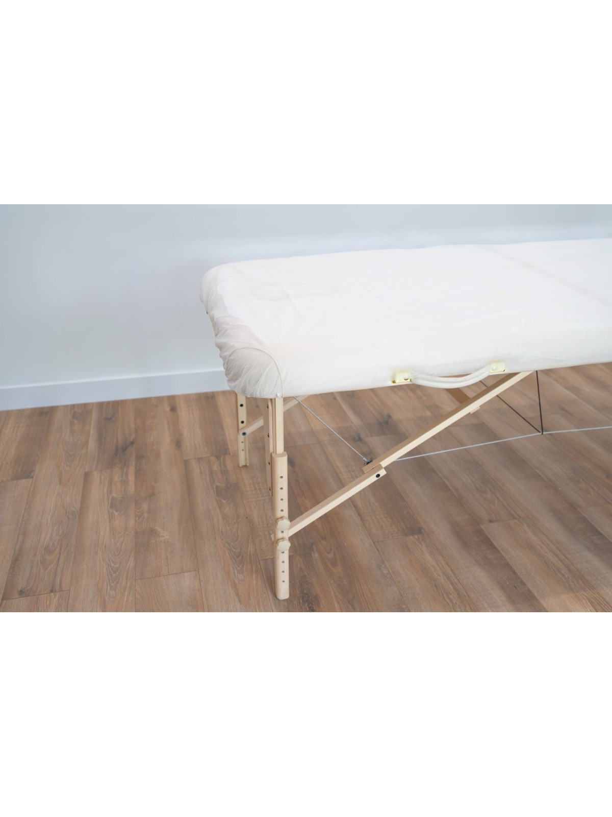 Détail de la protection jetable pour table de massage, montrant sa texture douce et résistante pour un confort optimal.