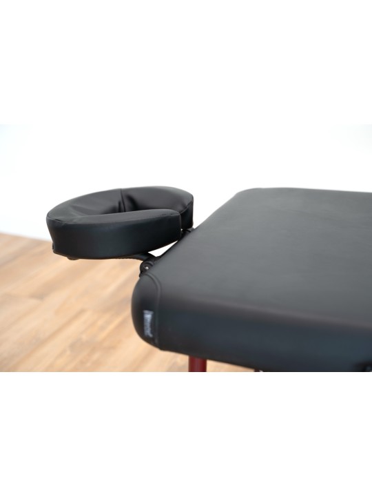 Vue latérale de la table de massage Zephyr, soulignant la qualité de sa finition et sa stabilité professionnelle.