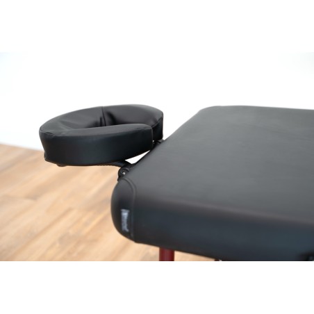 Vue latérale de la table de massage Zephyr, soulignant la qualité de sa finition et sa stabilité professionnelle.